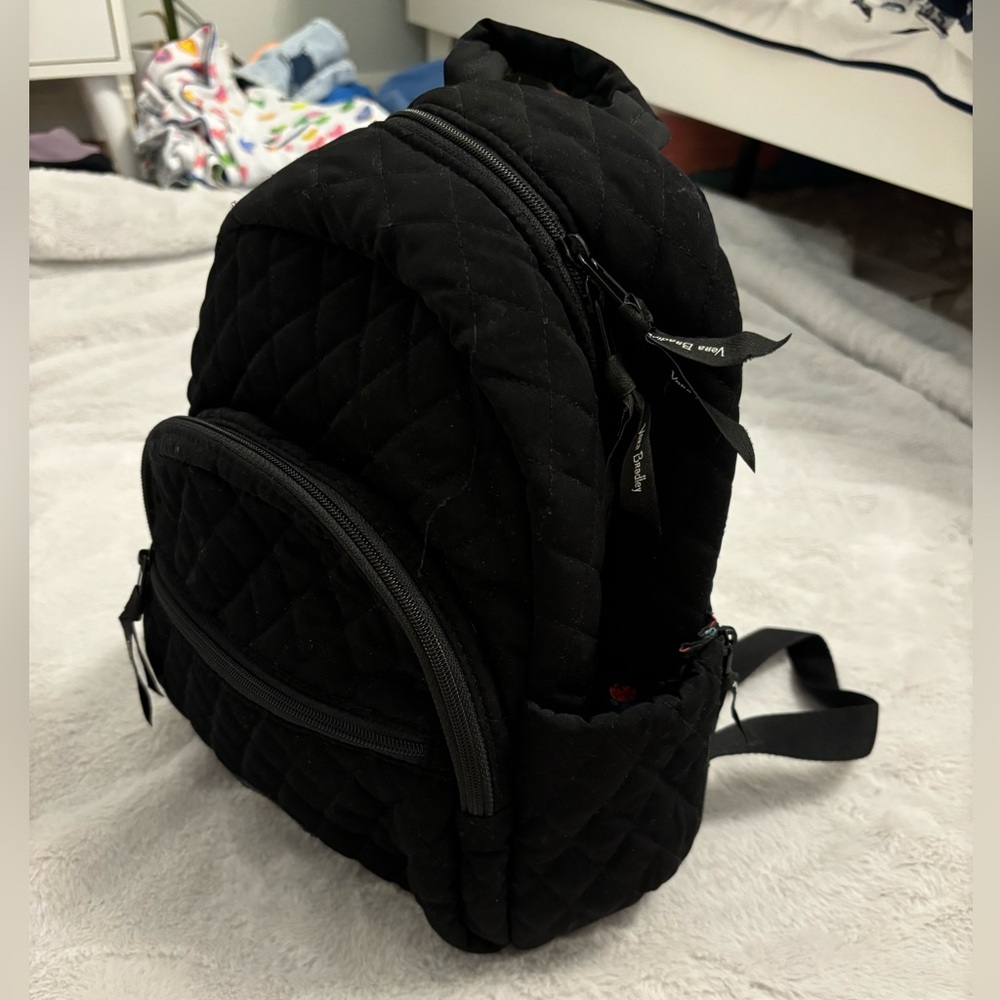 Vera Bradley black mini backpack with rose interior.
